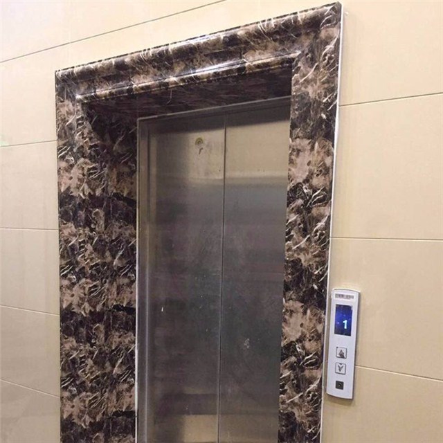 Marble door surround for lift door